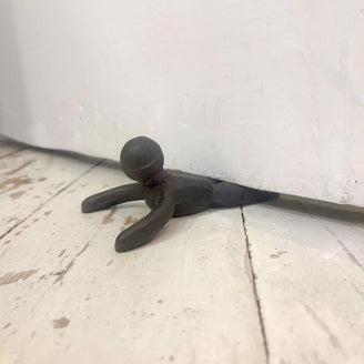 Iron Figure Door Wedge